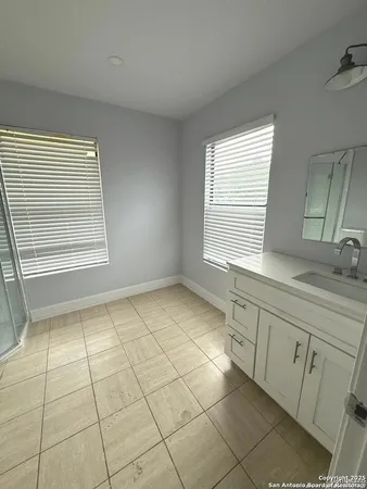 a view of a kitchen with a sink