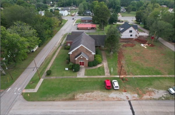 501 West Broad Street Decherd, TN 37324 - Photo 14 of 14 an aerial view of a house with a yard and lake