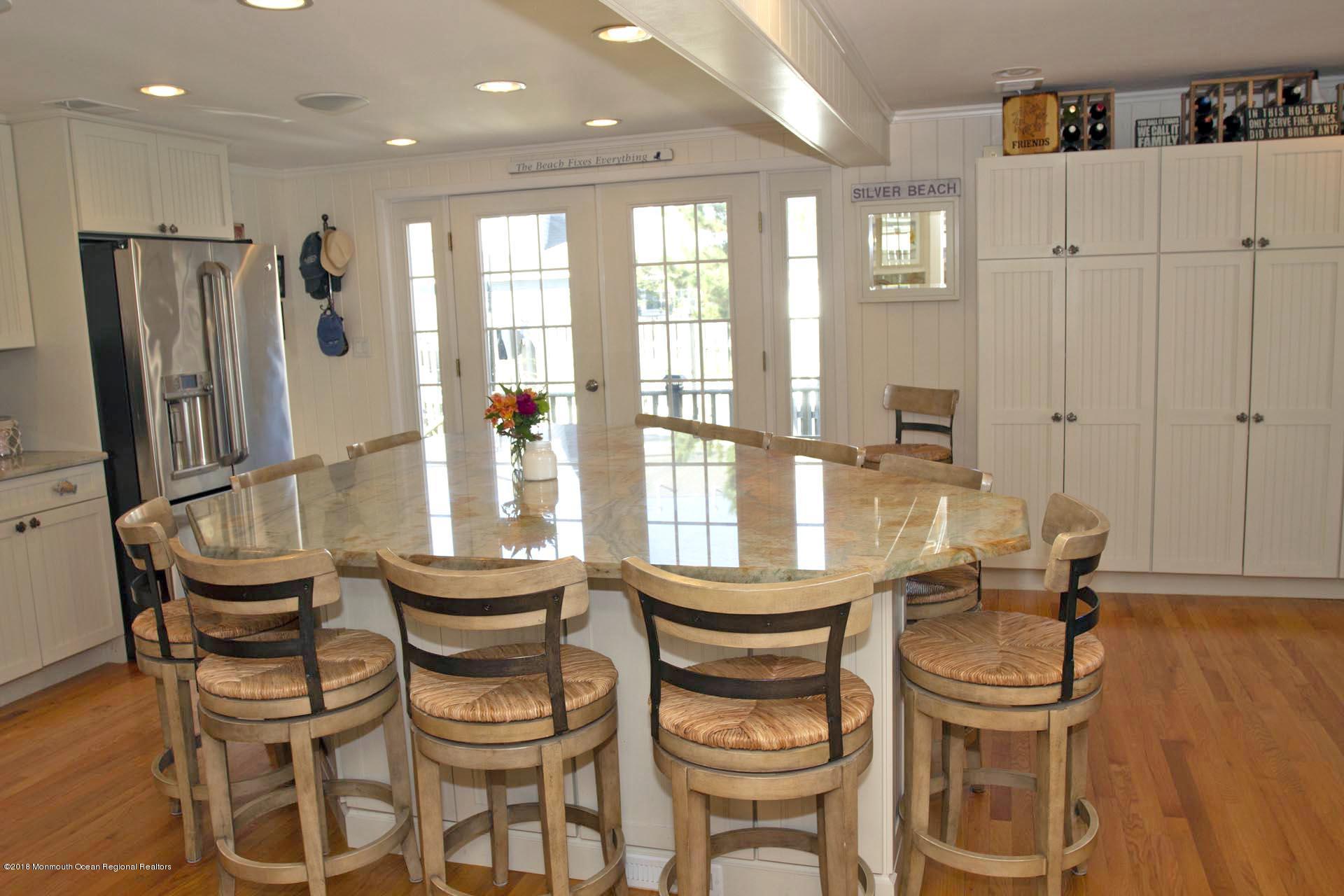 52 Fishermans Road Lavallette, NJ 08735 - Photo 11 of 74 a dining room with furniture and window