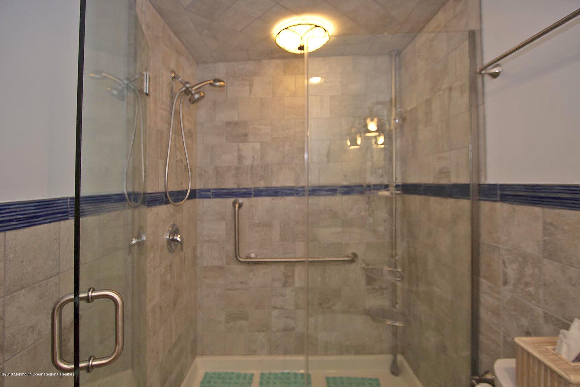 52 Fishermans Road Lavallette, NJ 08735 - Photo 29 of 74 a bathroom with a shower