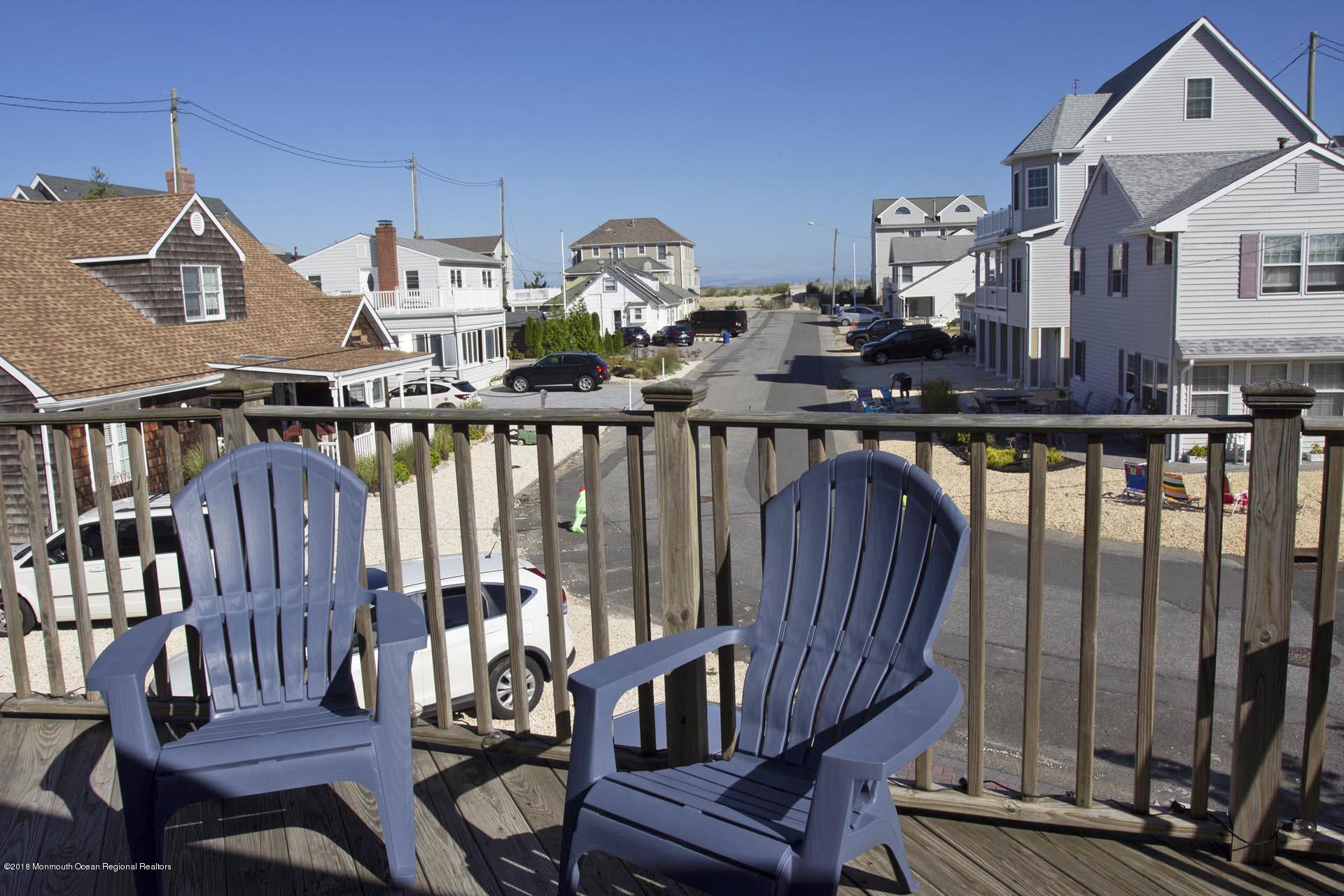 52 Fishermans Road Lavallette, NJ 08735 - Photo 51 of 74 a view of a balcony with furniture