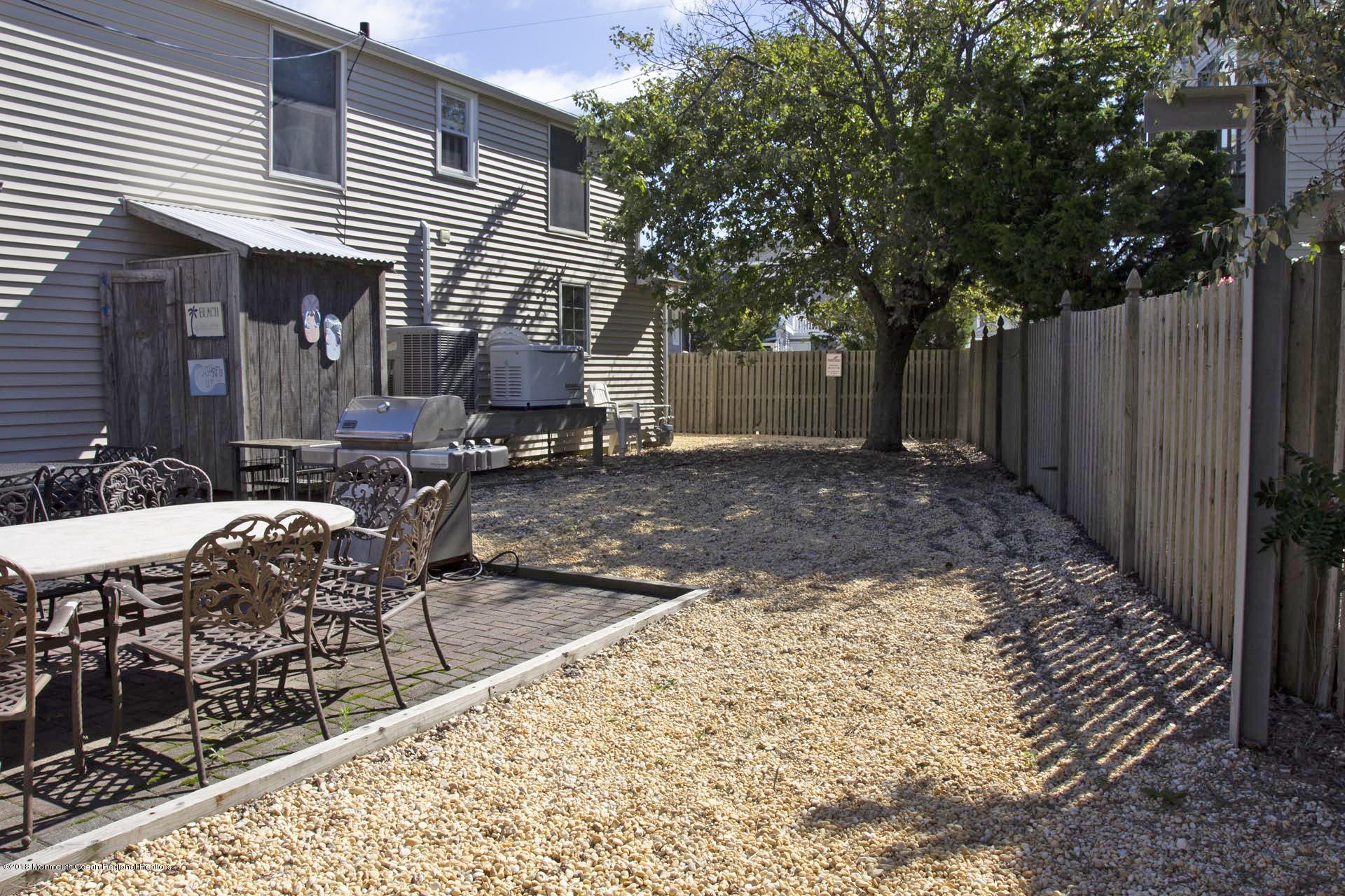 52 Fishermans Road Lavallette, NJ 08735 - Photo 60 of 74 a view of a house with backyard and sitting area