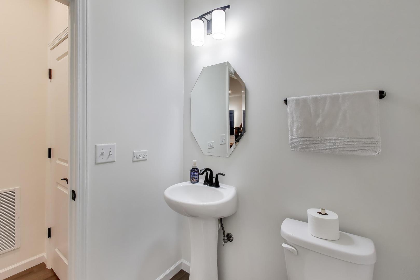 3744 Peregrine Way Elgin, IL 60124 - Photo 13 of 33 a bathroom with a sink and a mirror