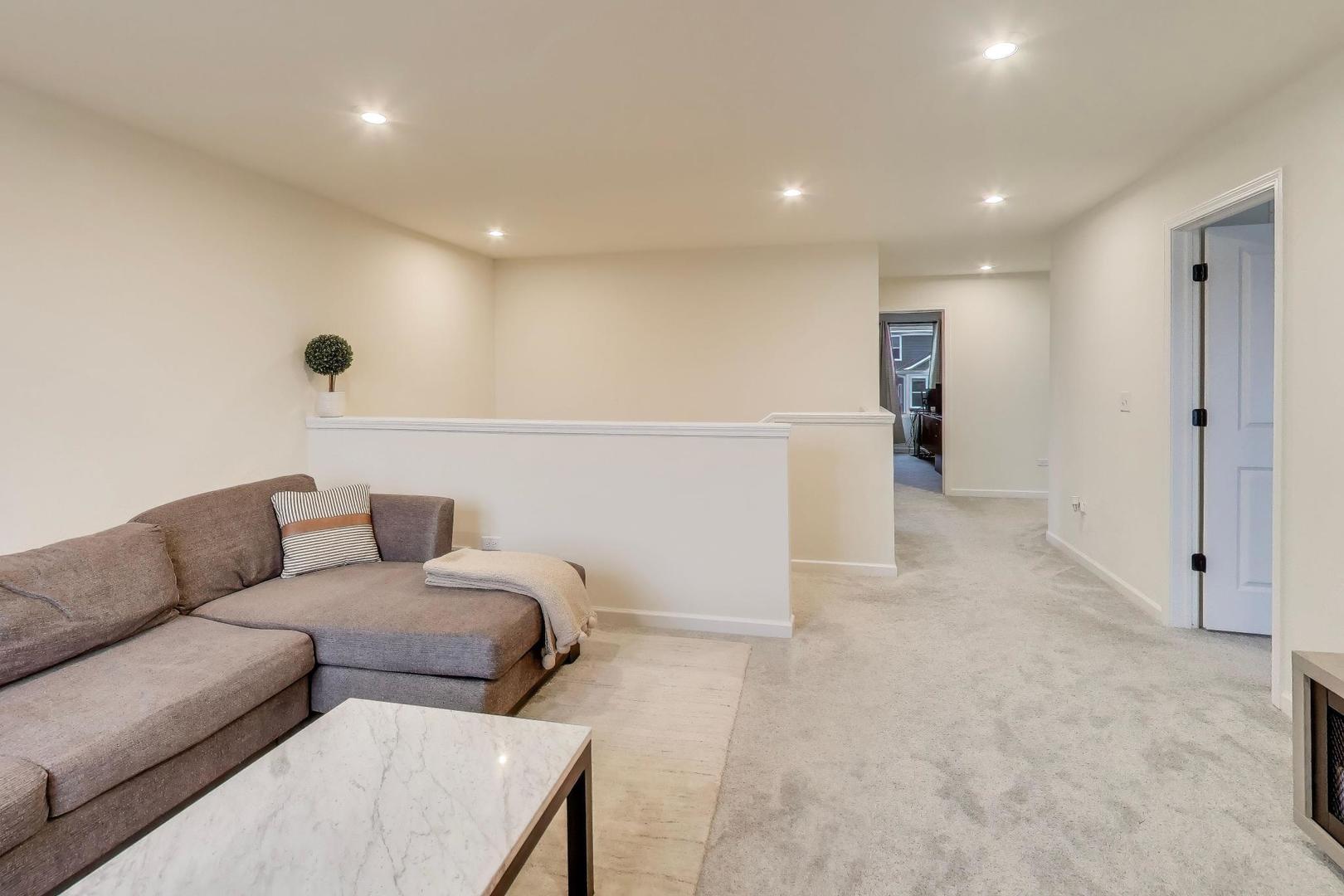 3744 Peregrine Way Elgin, IL 60124 - Photo 19 of 33 a living room with furniture