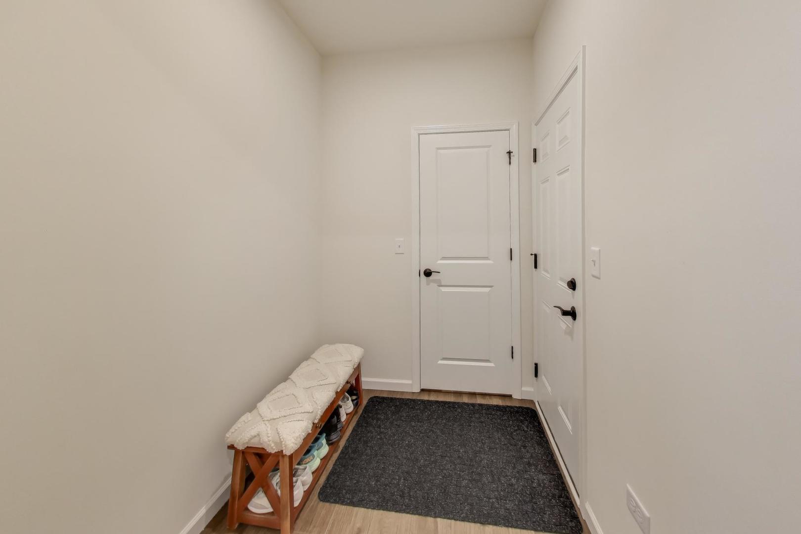 3744 Peregrine Way Elgin, IL 60124 - Photo 30 of 33 a view of room with stairs and a rug