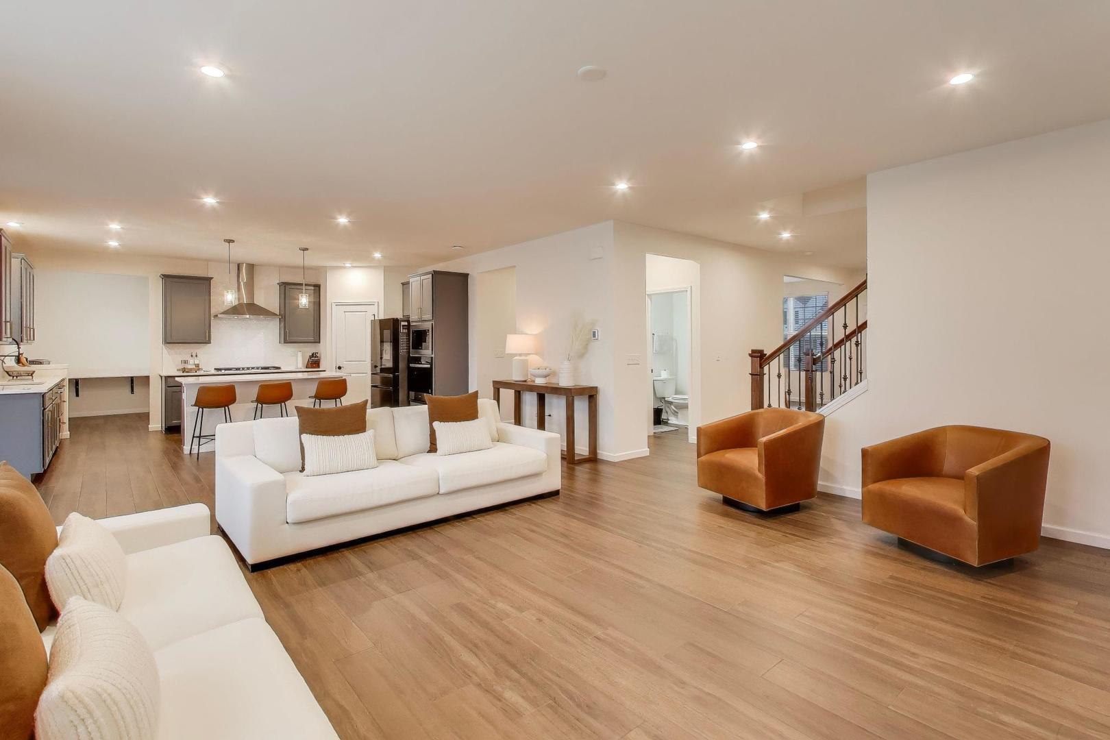 3744 Peregrine Way Elgin, IL 60124 - Photo 9 of 33 a living room with furniture and kitchen view