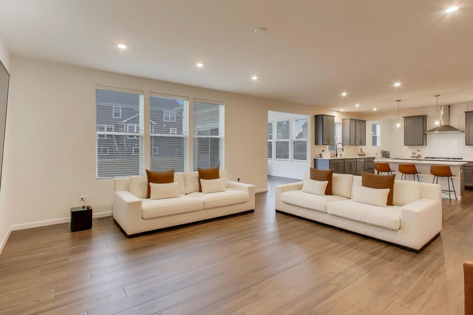 3744 Peregrine Way Elgin, IL 60124 - Photo 10 of 33 a living room with furniture and a large window