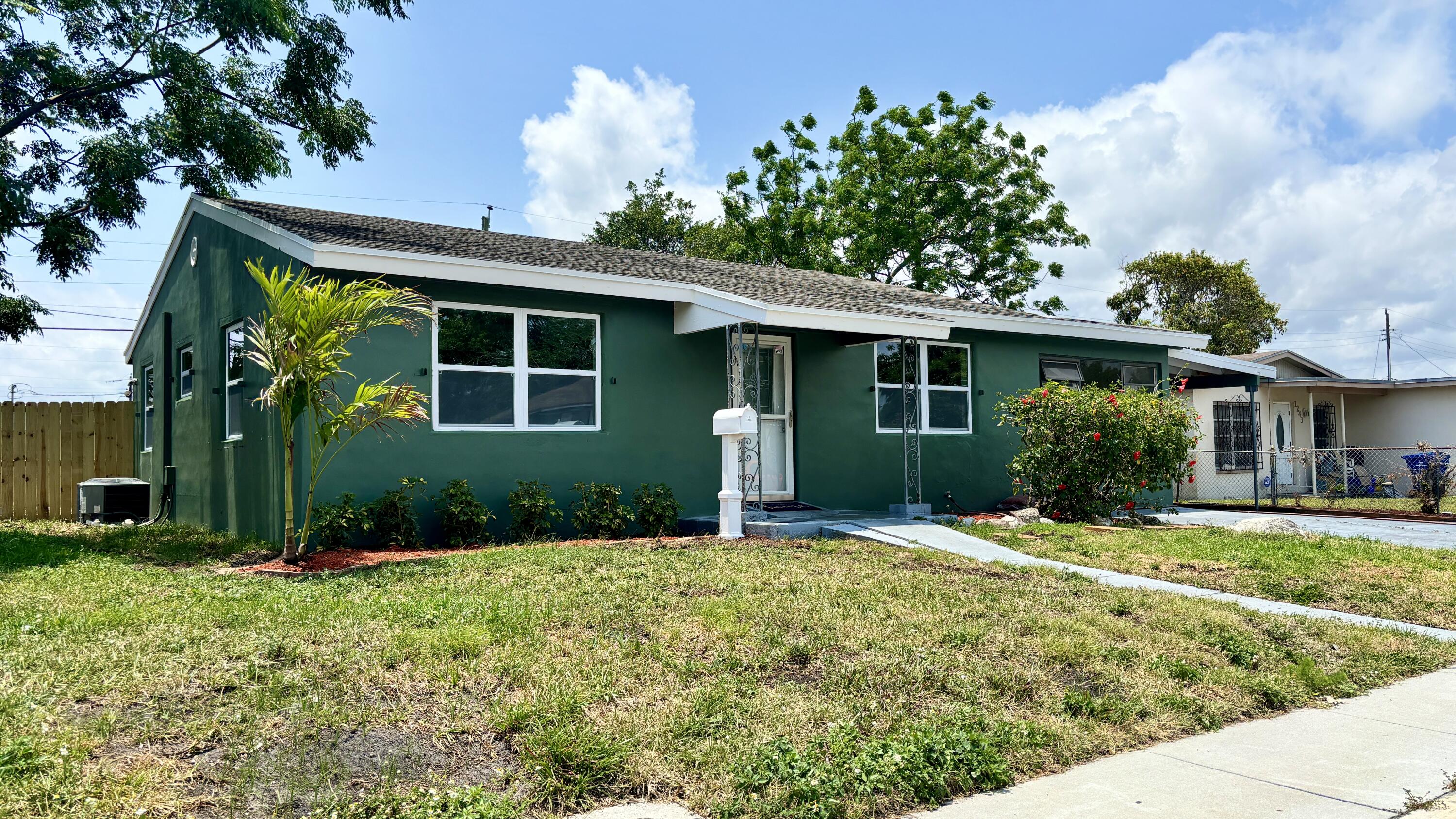 1237 West 25th Street Riviera Beach, FL 33404 - Photo 1 of 24 Frontage