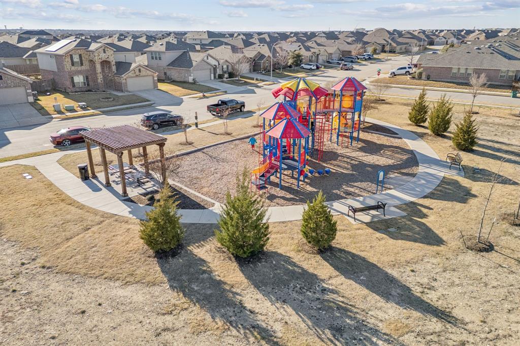437 Frio Pass Trail Fort Worth, TX 76052 - Photo 25 of 28 an outdoor space with seating