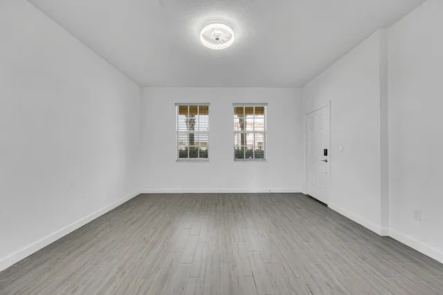 an empty room with windows