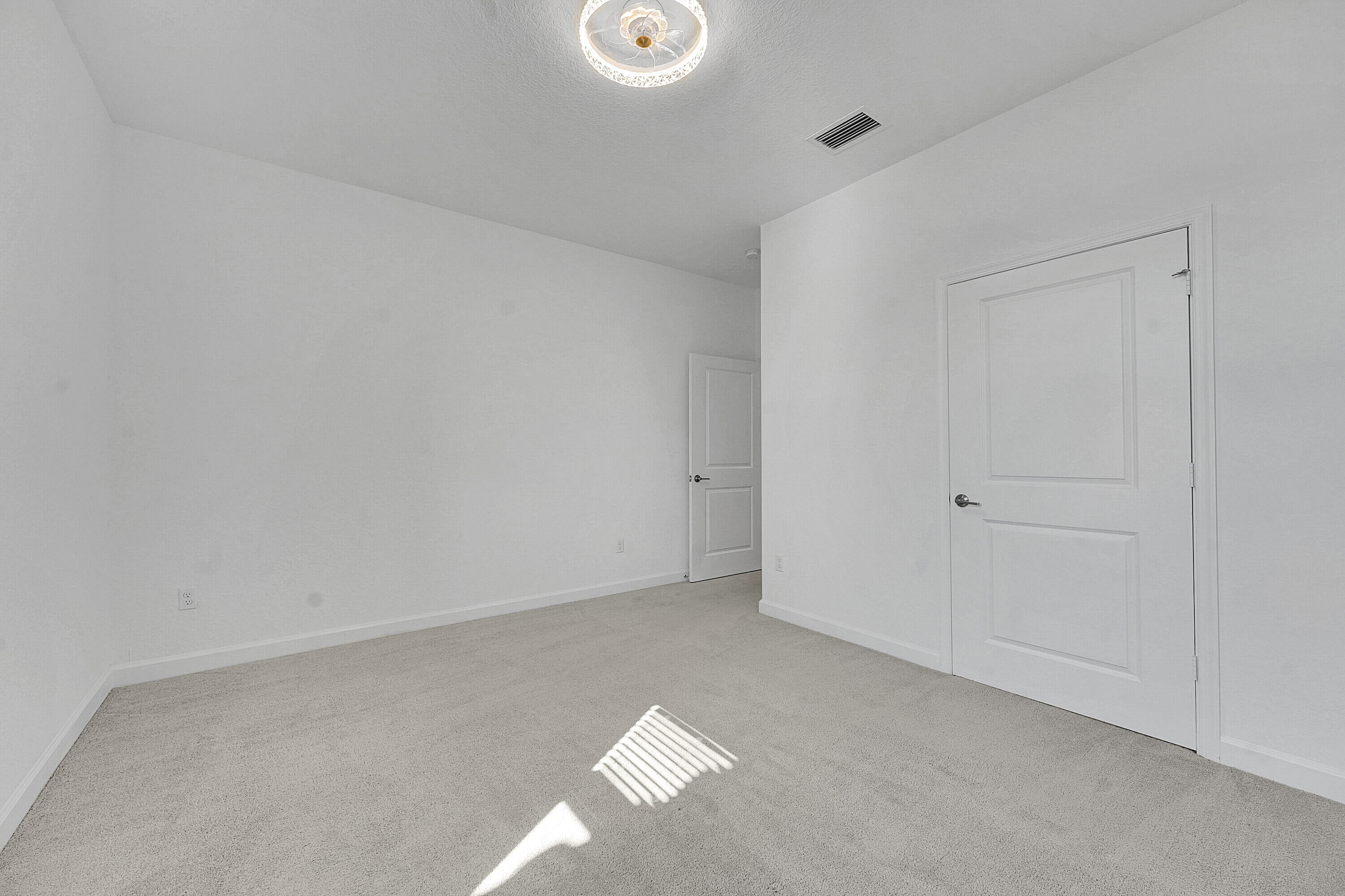 13096 Northwest Copper Creek Drive Port St. Lucie, FL 34987 - Photo 17 of 64 a view of empty room