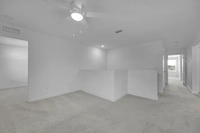 a view of a room with racks on the wall