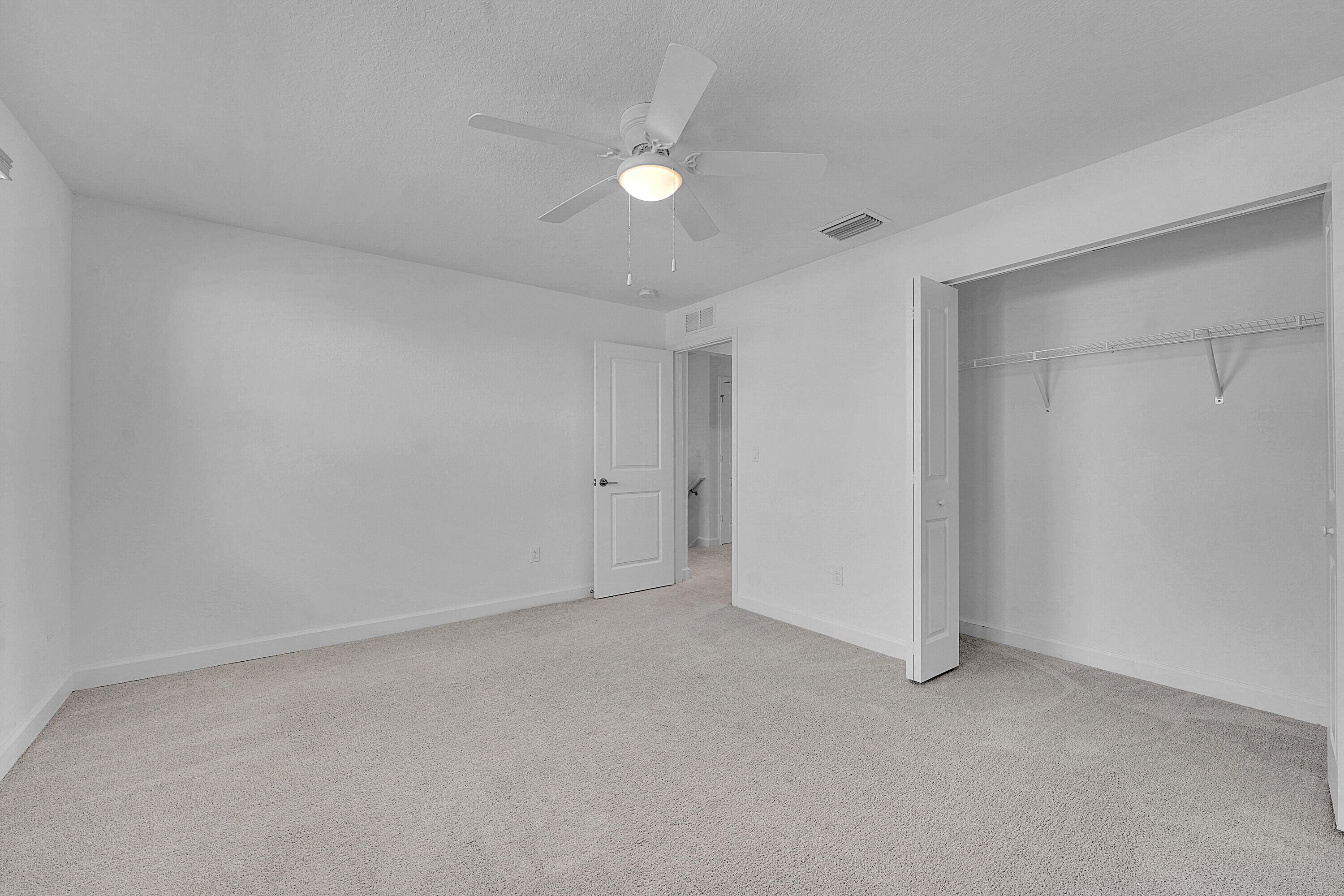 13096 Northwest Copper Creek Drive Port St. Lucie, FL 34987 - Photo 27 of 64 a view of an empty room
