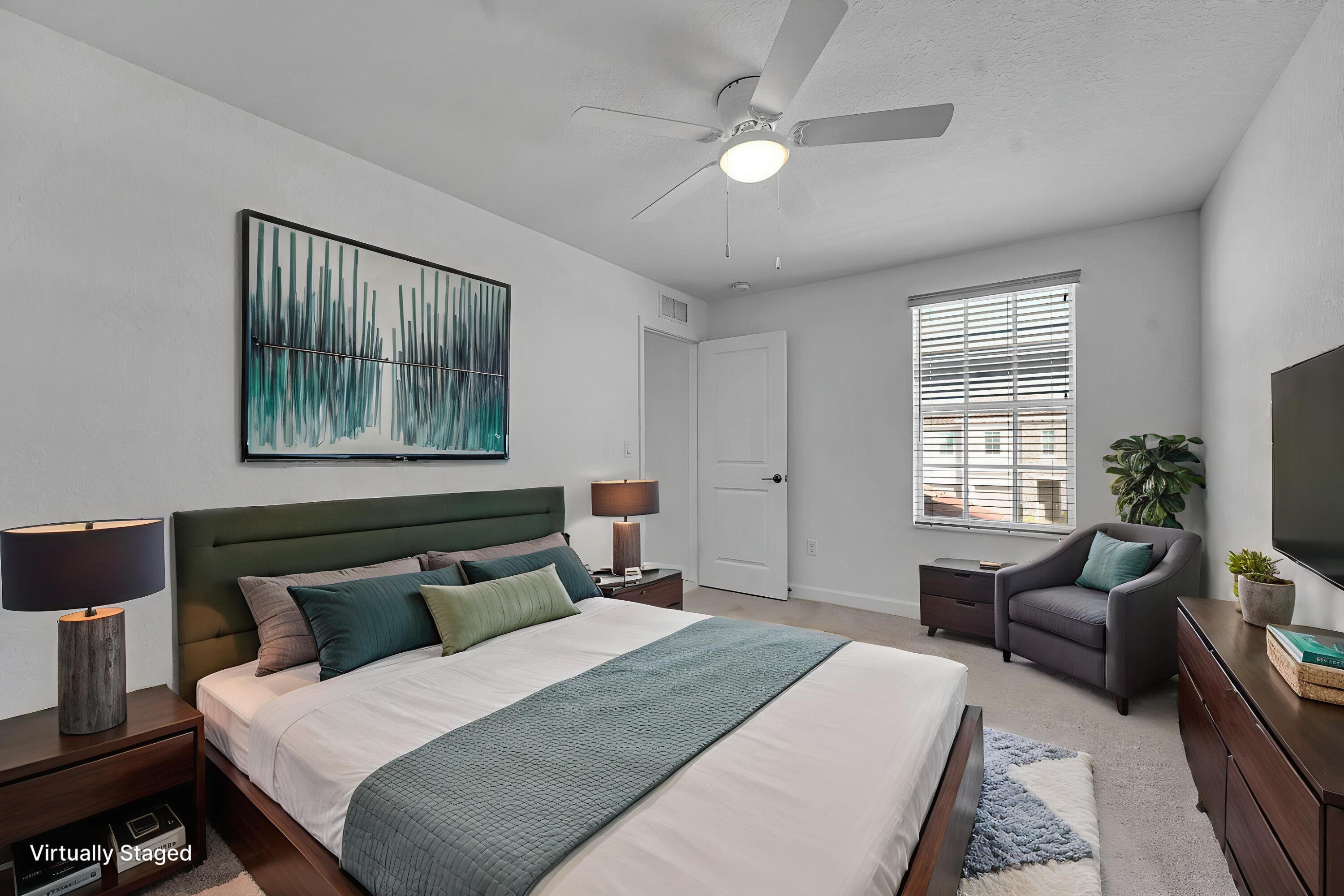 13096 Northwest Copper Creek Drive Port St. Lucie, FL 34987 - Photo 31 of 64 a bedroom with furniture and a window