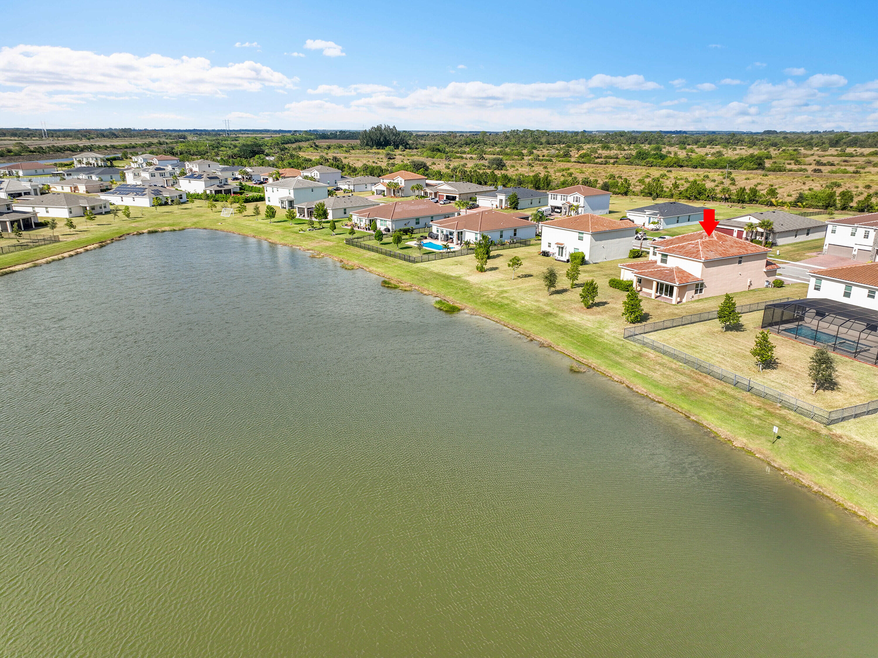 13096 Northwest Copper Creek Drive Port St. Lucie, FL 34987 - Photo 46 of 64 a view of an ocean and city