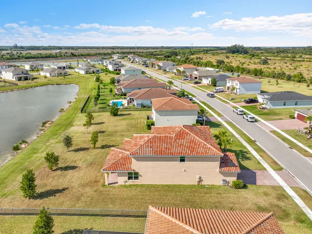 a view of a swimming pool with a lounge chairs