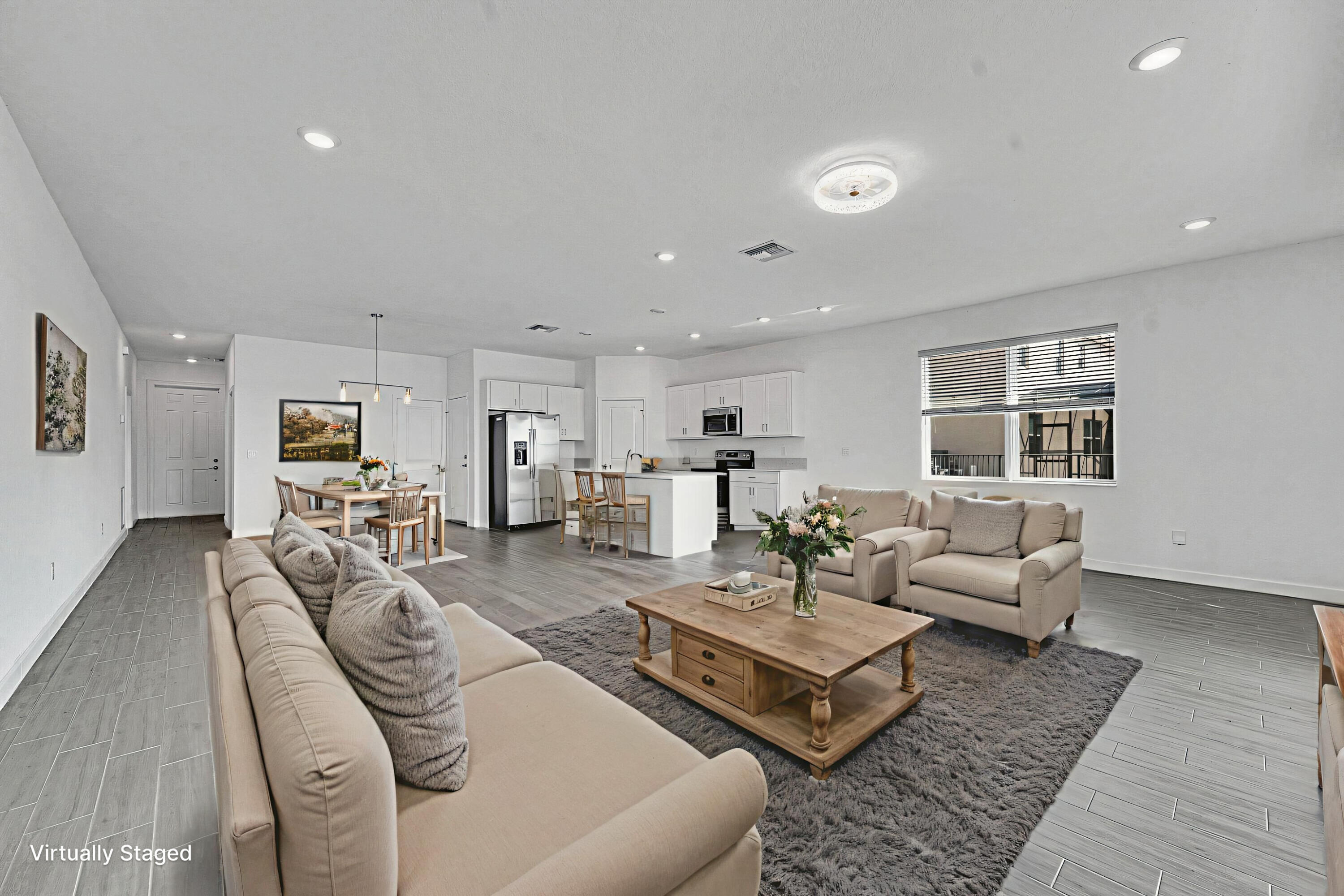 13096 Northwest Copper Creek Drive Port St. Lucie, FL 34987 - Photo 9 of 64 a living room with furniture and wooden floor