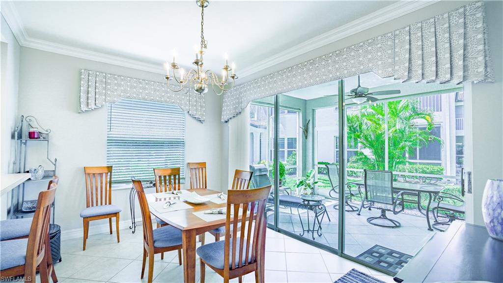 300 Diamond Circle, Unit 301 Naples, FL 34110 - Photo 19 of 43 a view of a dining room with furniture window and outside view
