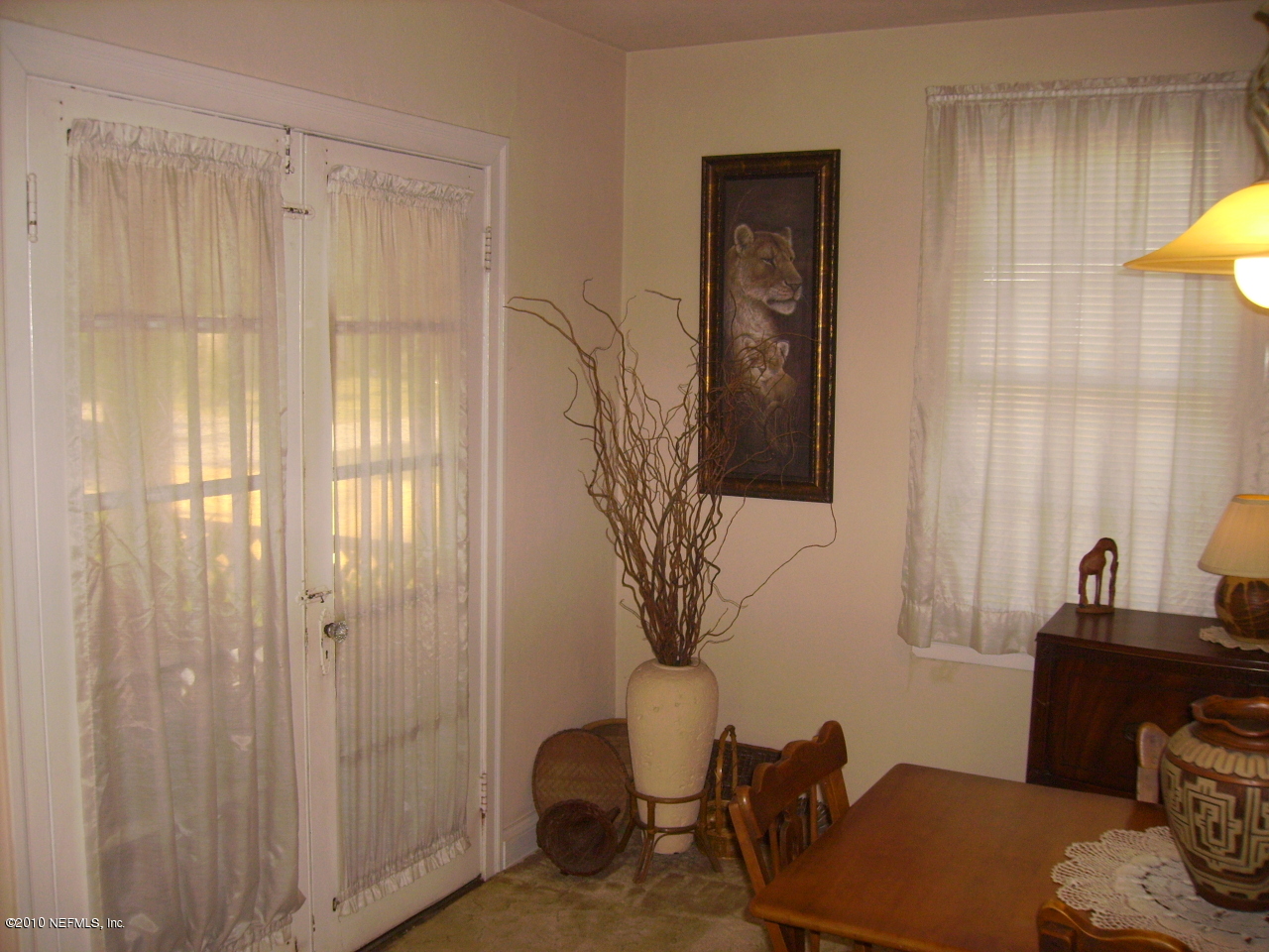 5146 Birkenhead Road Jacksonville, FL 32210 - Photo 4 of 13 a view of a livingroom with furniture and a window