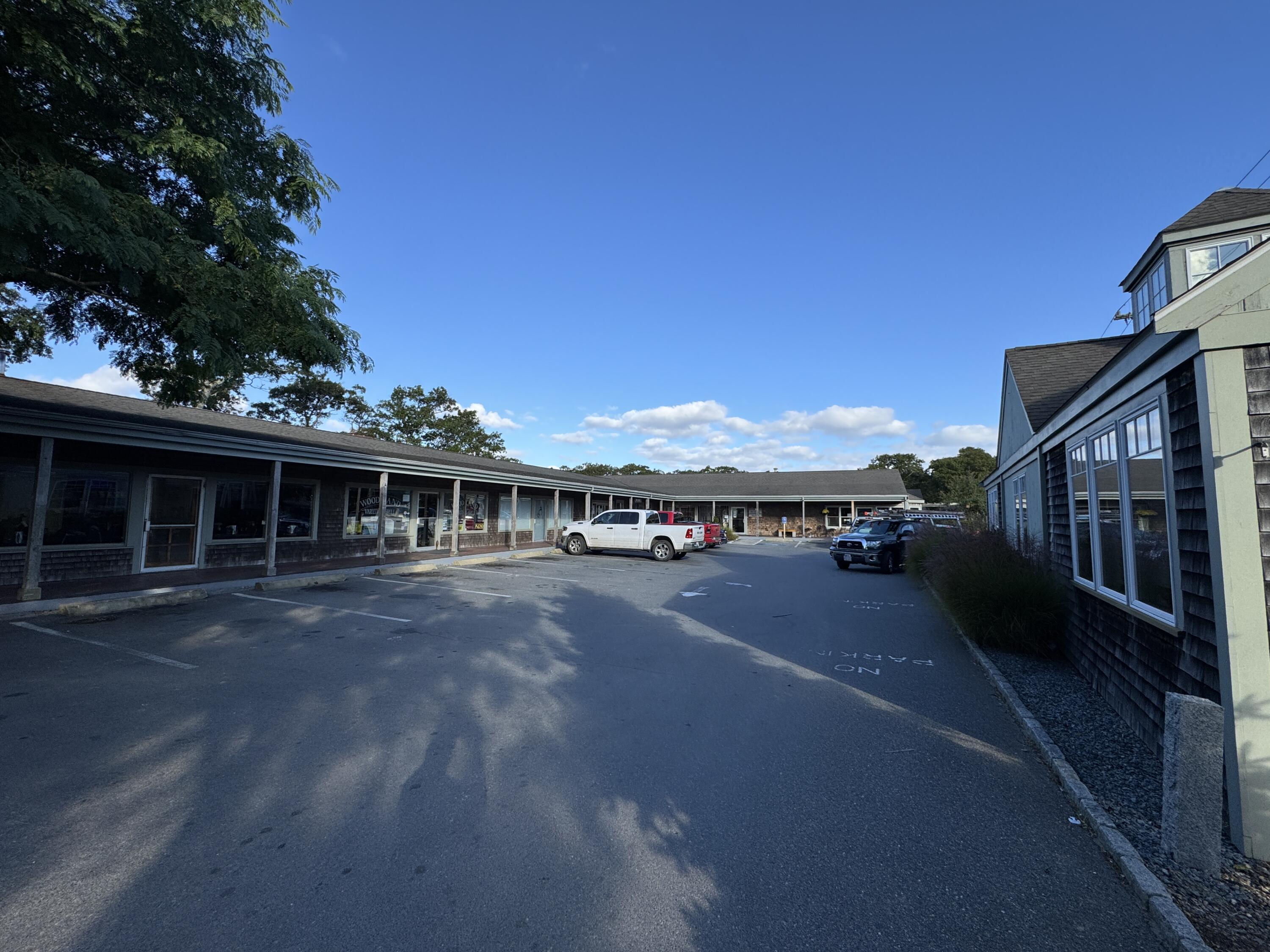 455 State Road, Unit 8 Vineyard Haven, MA 02568 - Photo 12 of 12 a view of a house with roof and sitting space