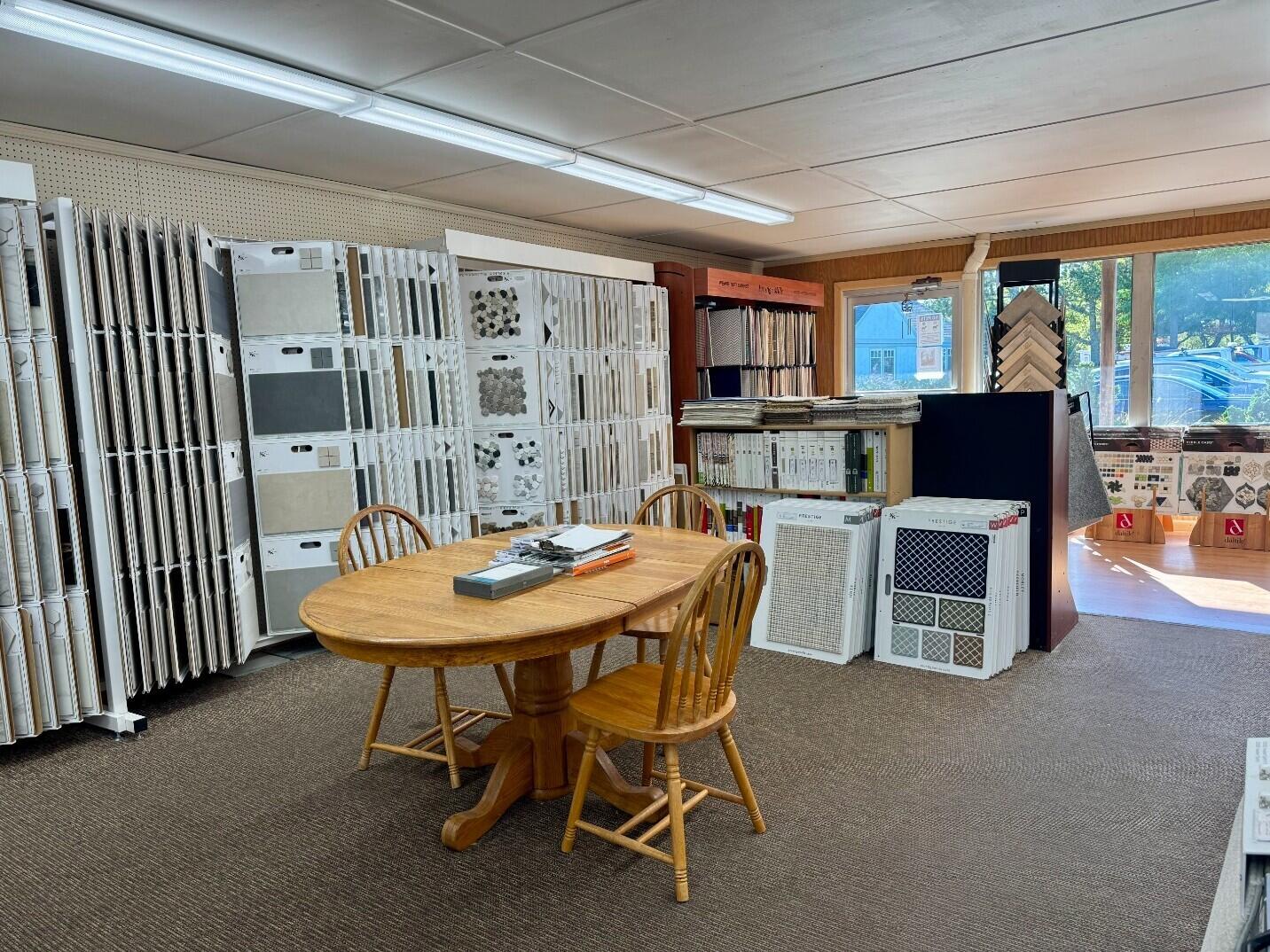 455 State Road, Unit 8 Vineyard Haven, MA 02568 - Photo 3 of 12 a view of a dining room with furniture window and outside view
