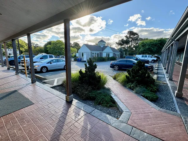 a view of yard with patio