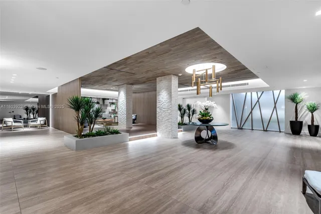 a view of a livingroom with furniture and a fireplace