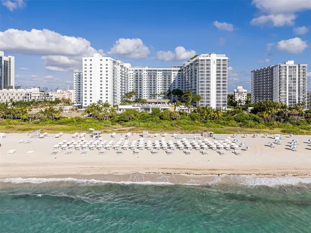 a view of a city with an ocean view