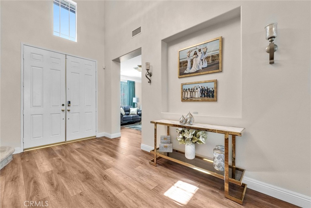 11499 Bridgeway Drive Riverside, CA 92505 - Photo 29 of 70 a view of room with window and wooden floor