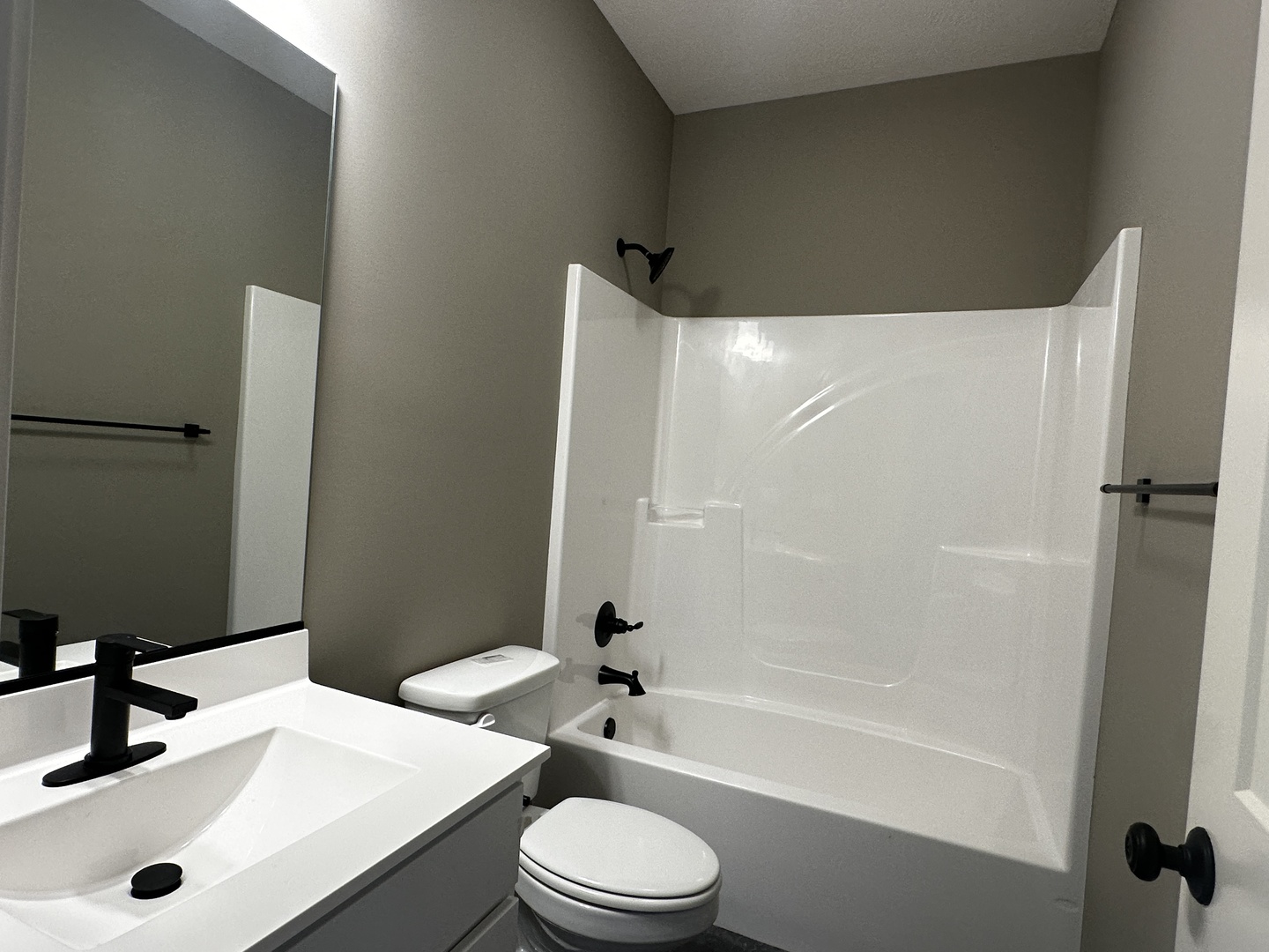 2523 Marble Road Normal, IL 61761 - Photo 18 of 23 a bathroom with a sink toilet and shower