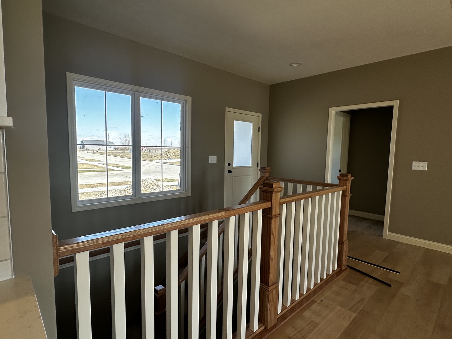 2523 Marble Road Normal, IL 61761 - Photo 3 of 23 a view of a hallway with wooden floor and windows