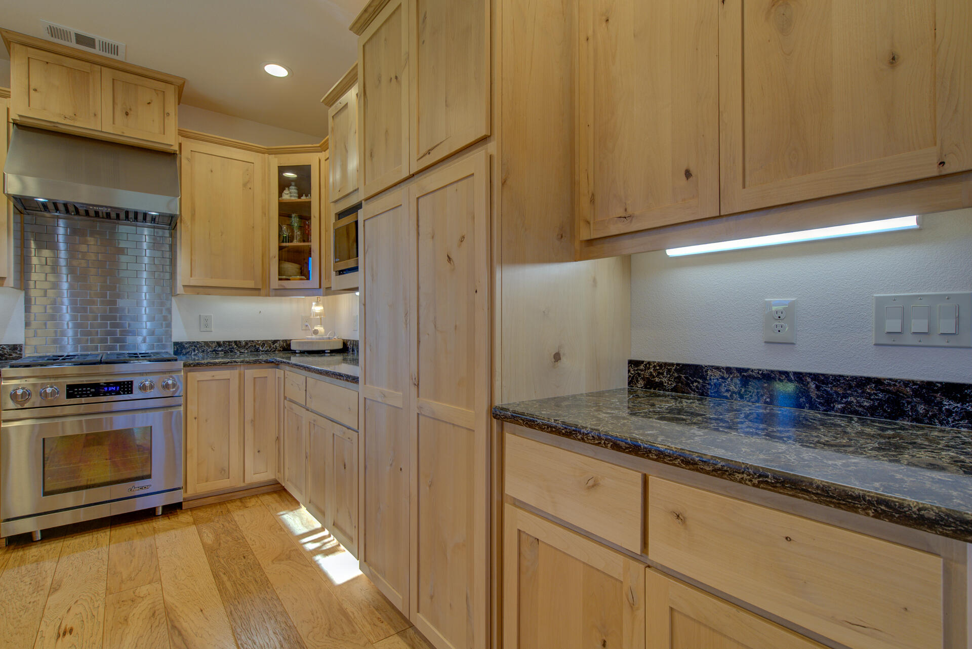 13575 English Way Oak Run, CA 96069 - Photo 18 of 56 a kitchen with stainless steel appliances granite countertop a stove a sink and a refrigerator