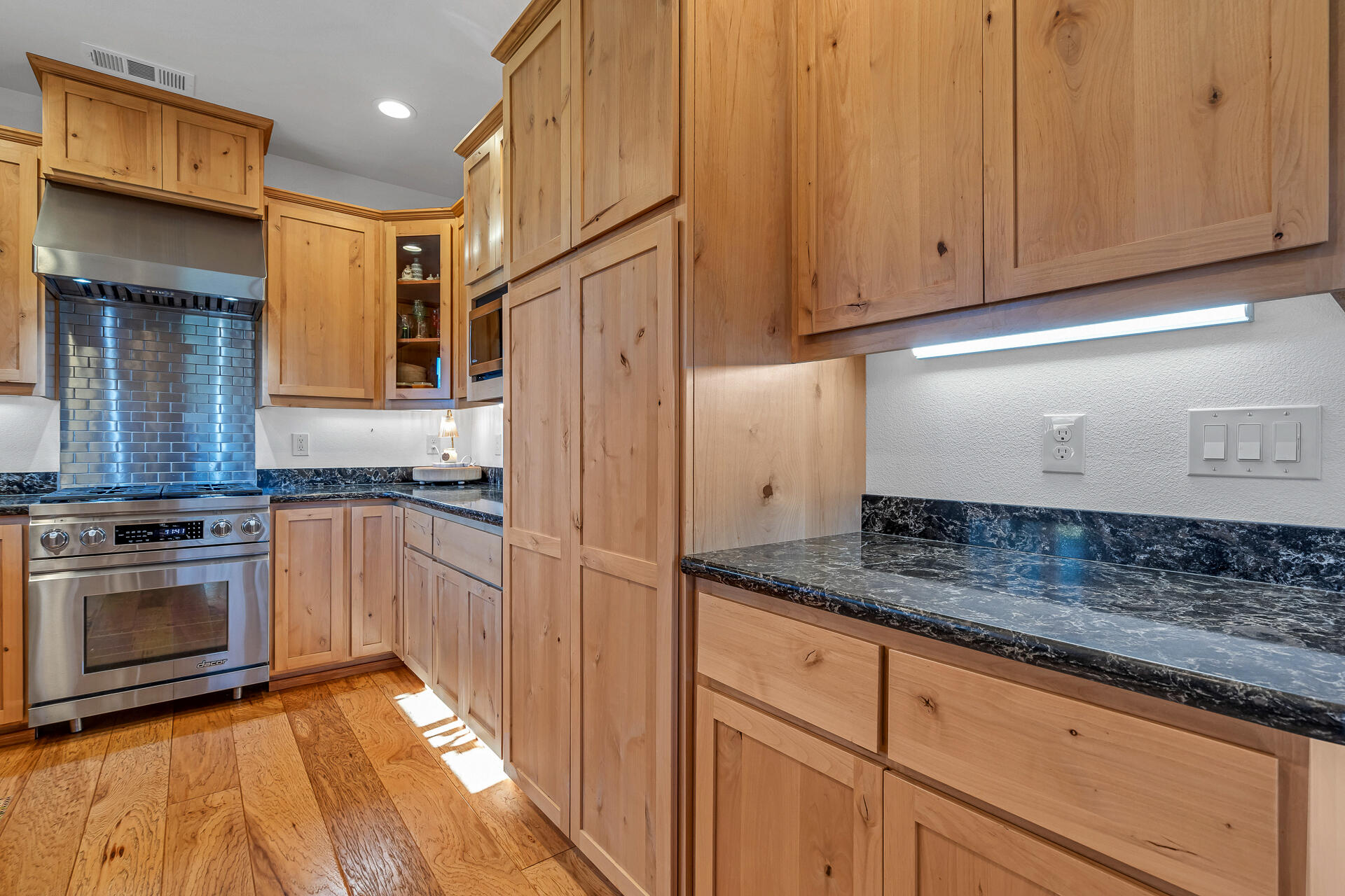 13575 English Way Oak Run, CA 96069 - Photo 21 of 56 a kitchen with stainless steel appliances granite countertop a stove a sink and a refrigerator