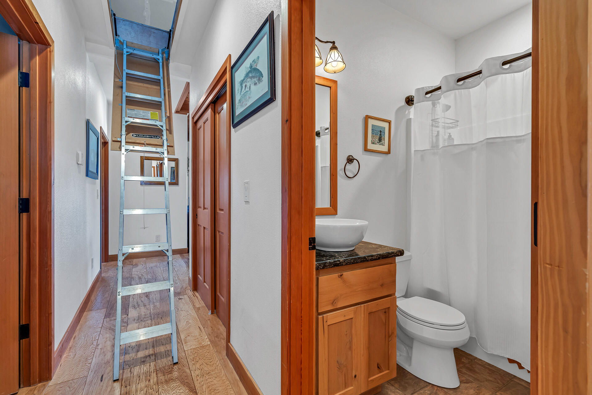 13575 English Way Oak Run, CA 96069 - Photo 28 of 56 a bathroom with a granite countertop toilet and a shower