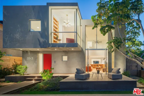 a view of house with outdoor space and seating area