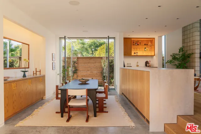 a workspace with furniture and window