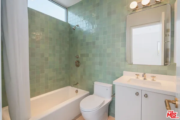 a view of entryway with stairs and wooden floor