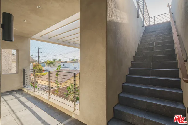 a view of a terrace with wooden floor