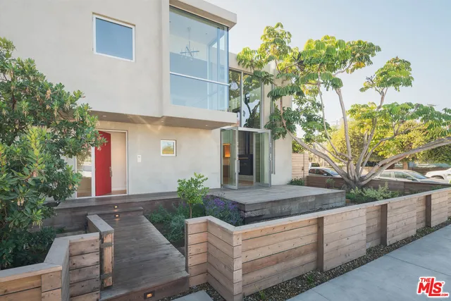 a view of house with outdoor space and seating area