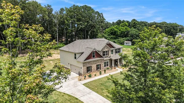 front view of a house with a yard