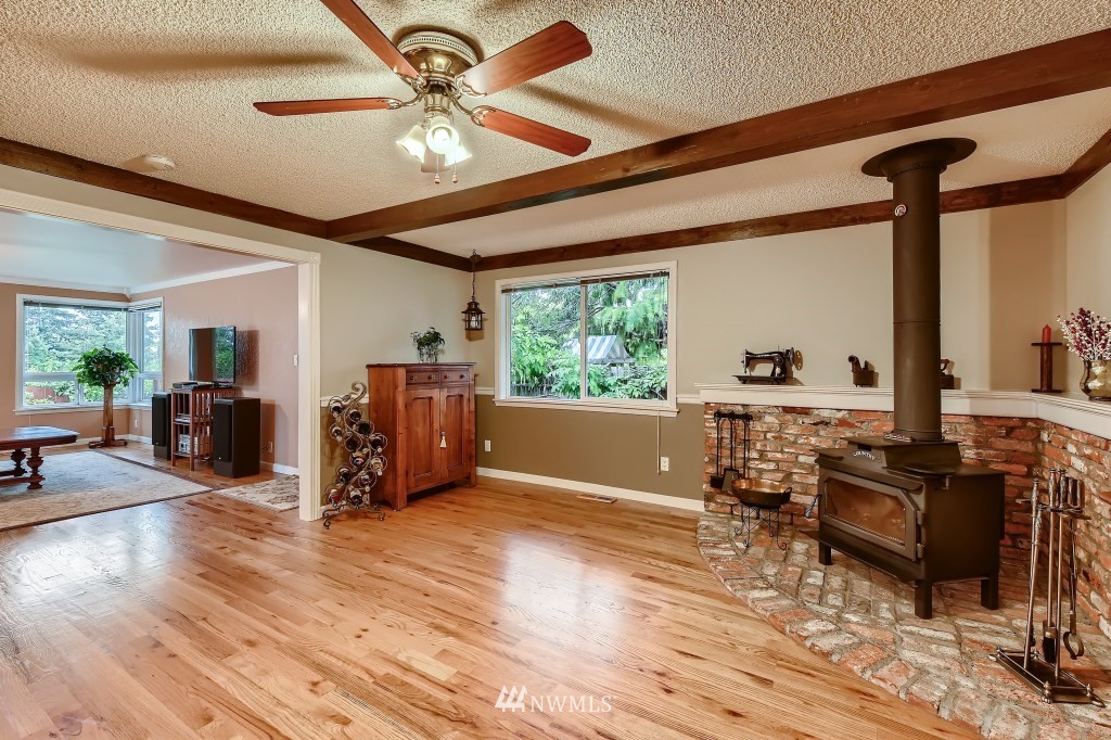 32219 22nd Avenue Southwest Federal Way, WA 98023 - Photo 17 of 36 a living room with furniture and a large window