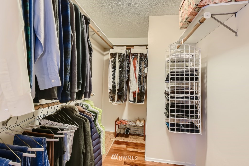 32219 22nd Avenue Southwest Federal Way, WA 98023 - Photo 27 of 36 a view of walk in closet with clothes and shoes
