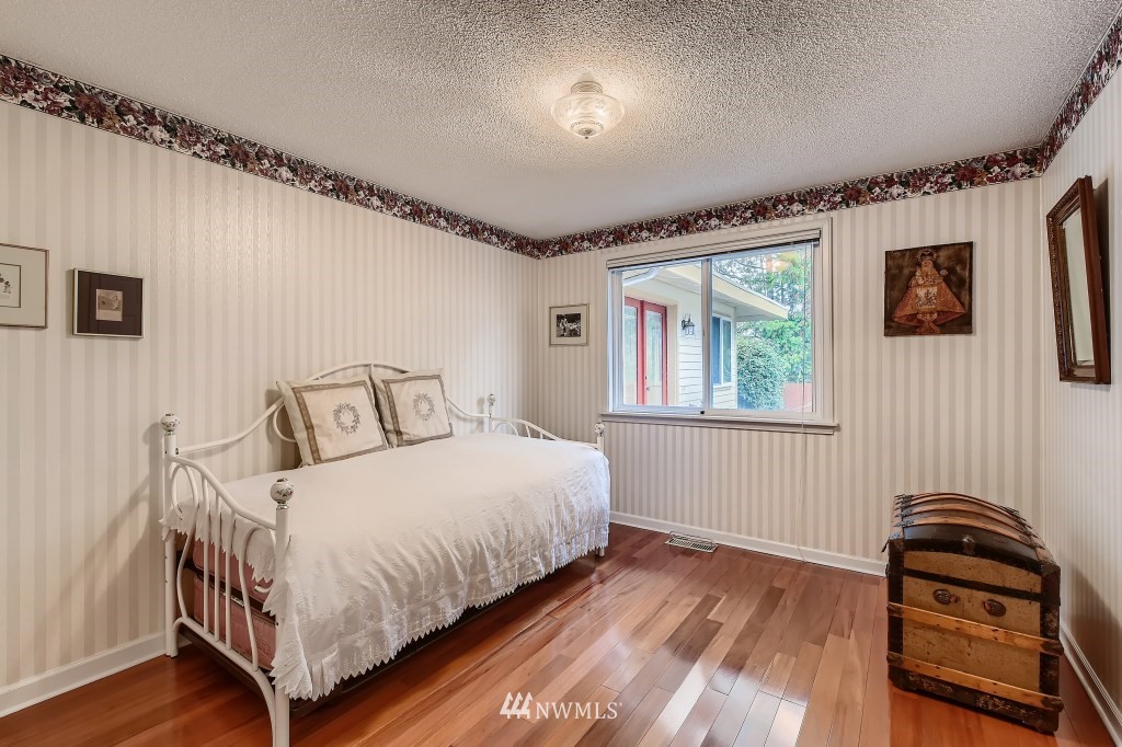 32219 22nd Avenue Southwest Federal Way, WA 98023 - Photo 29 of 36 a bedroom with a bed and a window