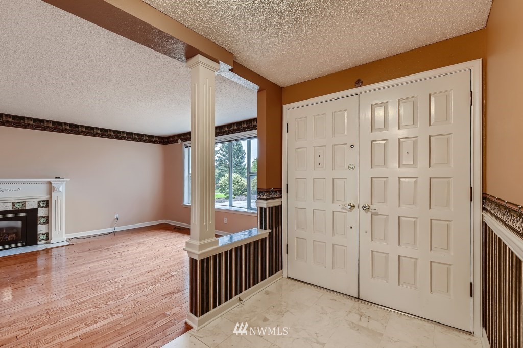 32219 22nd Avenue Southwest Federal Way, WA 98023 - Photo 5 of 36 a view of livingroom with furniture and fireplace