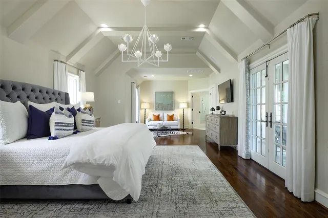 a living room with fireplace furniture and a flat screen tv