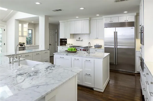 a view of living room filled with furniture and a window