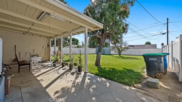 a view of yard with patio