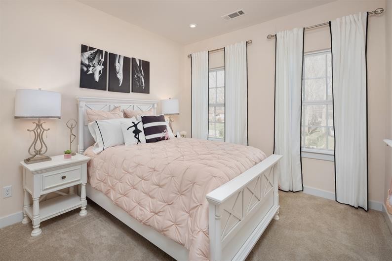 1030 Oglethorpe Drive Franklin, TN 37064 - Photo 14 of 17 a bedroom with a bed and a lamp