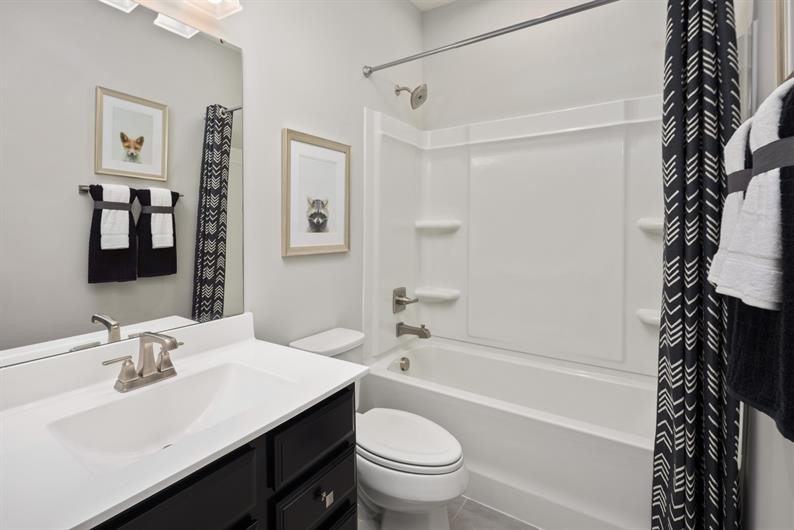 1030 Oglethorpe Drive Franklin, TN 37064 - Photo 15 of 17 a bathroom with a sink a toilet and a bathtub