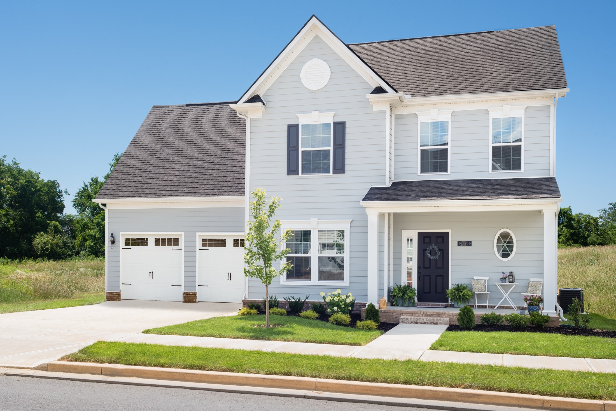 1030 Oglethorpe Drive Franklin, TN 37064 - Photo 17 of 17 a front view of a house with a yard
